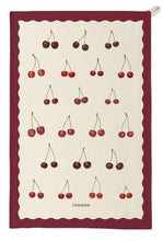 Load image into Gallery viewer, A rectangular kitchen towel with a cream center panel, scalloped burgundy border, and repeated cherry illustrations in red and dark burgundy. The word 'CERISIER' appears near the bottom.