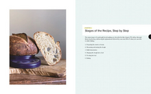 Load image into Gallery viewer, A book or booklet spread showing a rustic loaf of bread and a sliced piece on a wooden surface on the left page, and a chapter titled 'Stages of the Recipe, Step by Step' with a bulleted list on the right page, against a light gray background.