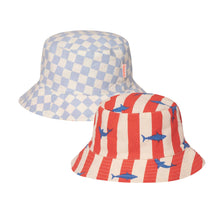 Load image into Gallery viewer, reversible kid's bucket hat showing both sides, one a light blue and cream check pattern, the other a red and cream stripe with blue sharks scattered around the pattern