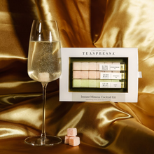Load image into Gallery viewer, Teaspressa&#39;s Luxe Mimosa Cubes mixer kit featuring Arcadia Orange, Lemon, and Grapefruit flavored cocktail cubes to drop directly into your champagne or sparkling water or an instant bubbly experience at home or on the go.
