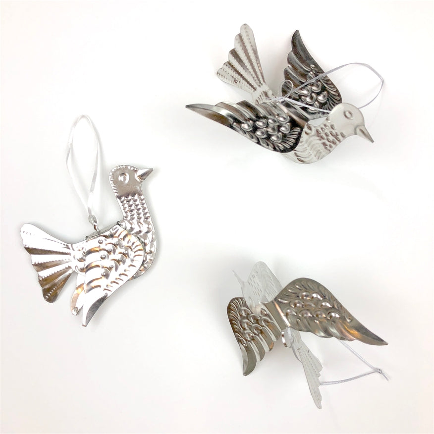 three silver stamped and punched tin metal dove ornaments for everyday or holiday decoration