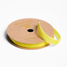 Load image into Gallery viewer, Spool of yellow velvet ribbon with 'Abigail Jayne Ribbon' branding on a white background
