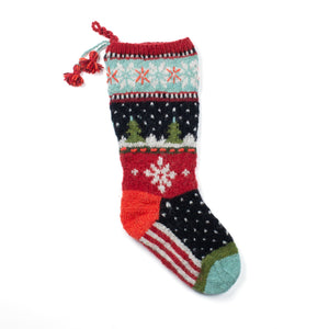 Multi-colored 100% wool knit stocking with snowflakes, trees, stripes and dots. Made in Nepal by Lost Horizons.