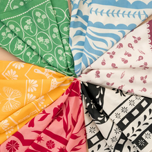 Load image into Gallery viewer, A close-up fan arrangement of patterned cotton bandanas in green, blue, white, yellow, pink, black, and red, each showing a different print design.
