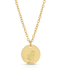 Load image into Gallery viewer, A gold chain necklace with a round gold disc pendant featuring an engraved floral design, shown on a clean white background.
