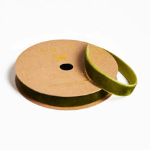 Load image into Gallery viewer, Spool of green velvet ribbon with a branded label on a white background
