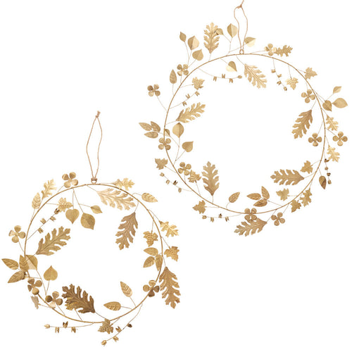 Golden leaves in die-cut metal shimmer in this stunnig holiday wreath.