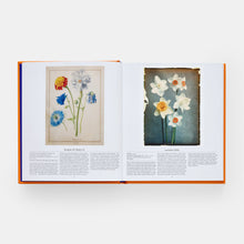 Load image into Gallery viewer, Open book displaying illustrations of flowers on a white background

