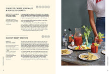 Load image into Gallery viewer, A two-page spread from a recipe book or cookbook. The left page has a beige background with recipe text for '5-Minute Crispy Rosemary &amp; Sea Salt Farinata' and 'Bloody Mary Station,' along with small icons.

