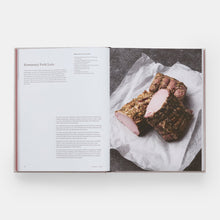 Load image into Gallery viewer, Open cookbook showing a recipe for Rosemary Pork Loaf on a white background
