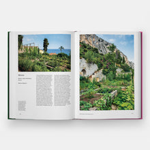 Load image into Gallery viewer, Open book showing images of a garden and mountainous landscape.
